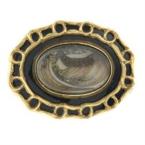 Mid 19th century black enamel mourning brooch