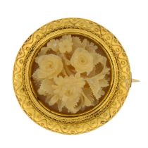 19th c. gold carved horn floral brooch