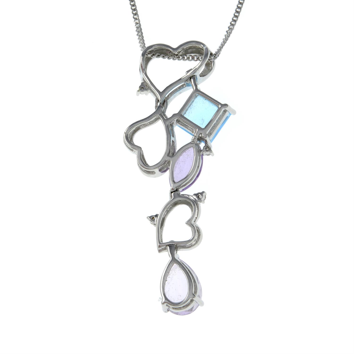 An 18ct gold amethyst, blue topaz and diamond openwork heart pendant, with 9ct gold chain. - Image 2 of 3