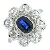 A sapphire and old-cut diamond cluster ring.