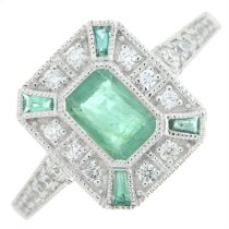 18ct gold emerald and diamond dress ring.