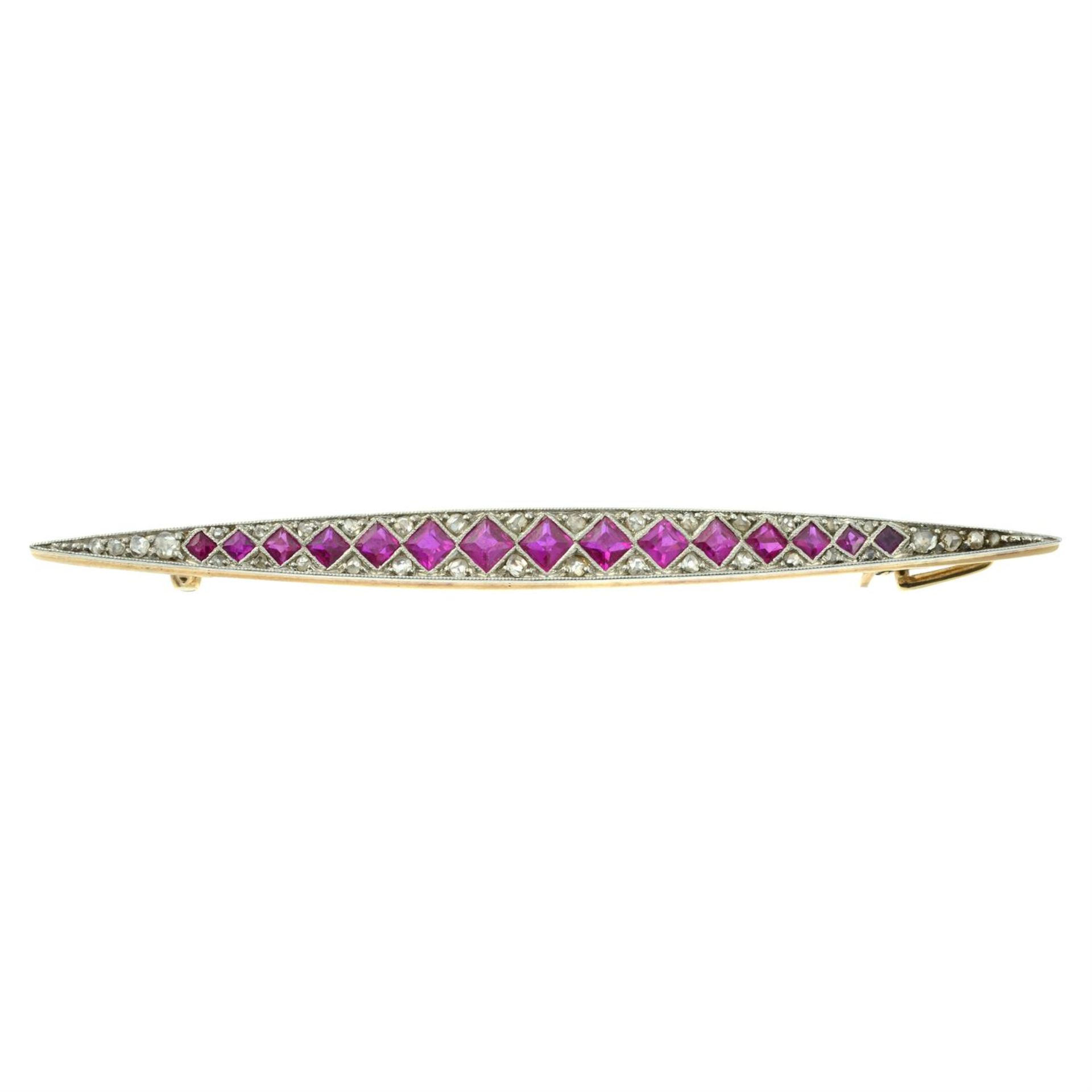 An Art Deco platinum and gold, synthetic ruby and diamond point bar brooch.
