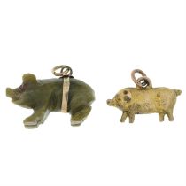 Two pig charms