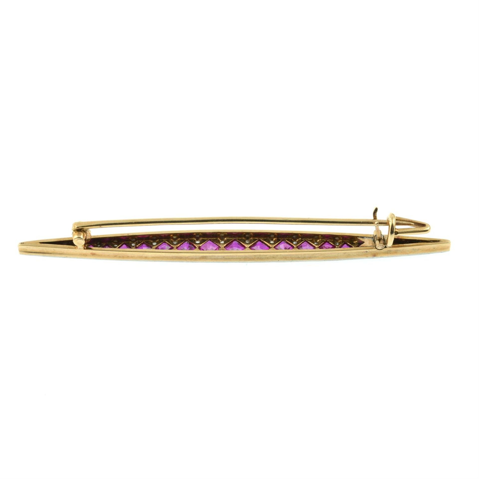 An Art Deco platinum and gold, synthetic ruby and diamond point bar brooch. - Image 2 of 4