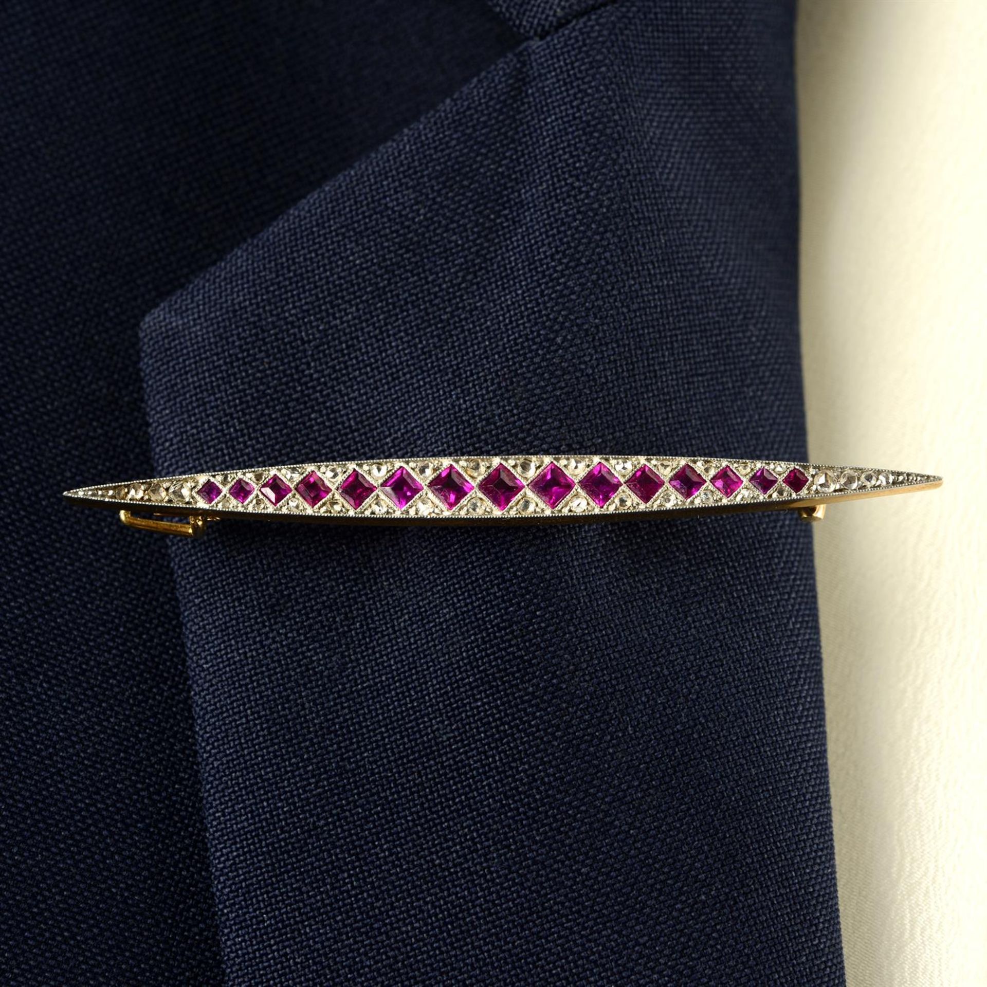 An Art Deco platinum and gold, synthetic ruby and diamond point bar brooch. - Image 3 of 4
