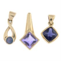 Three 9ct gold gem pendants