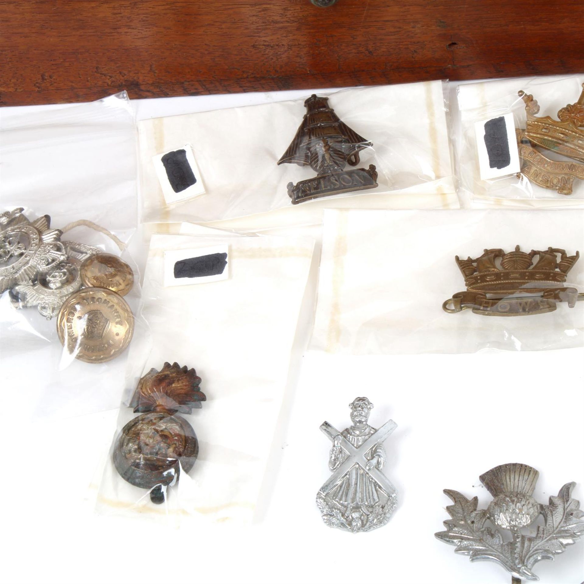 Assorted militaria to include cap badges, wire cutters, buttons and two walking sticks. - Image 4 of 5