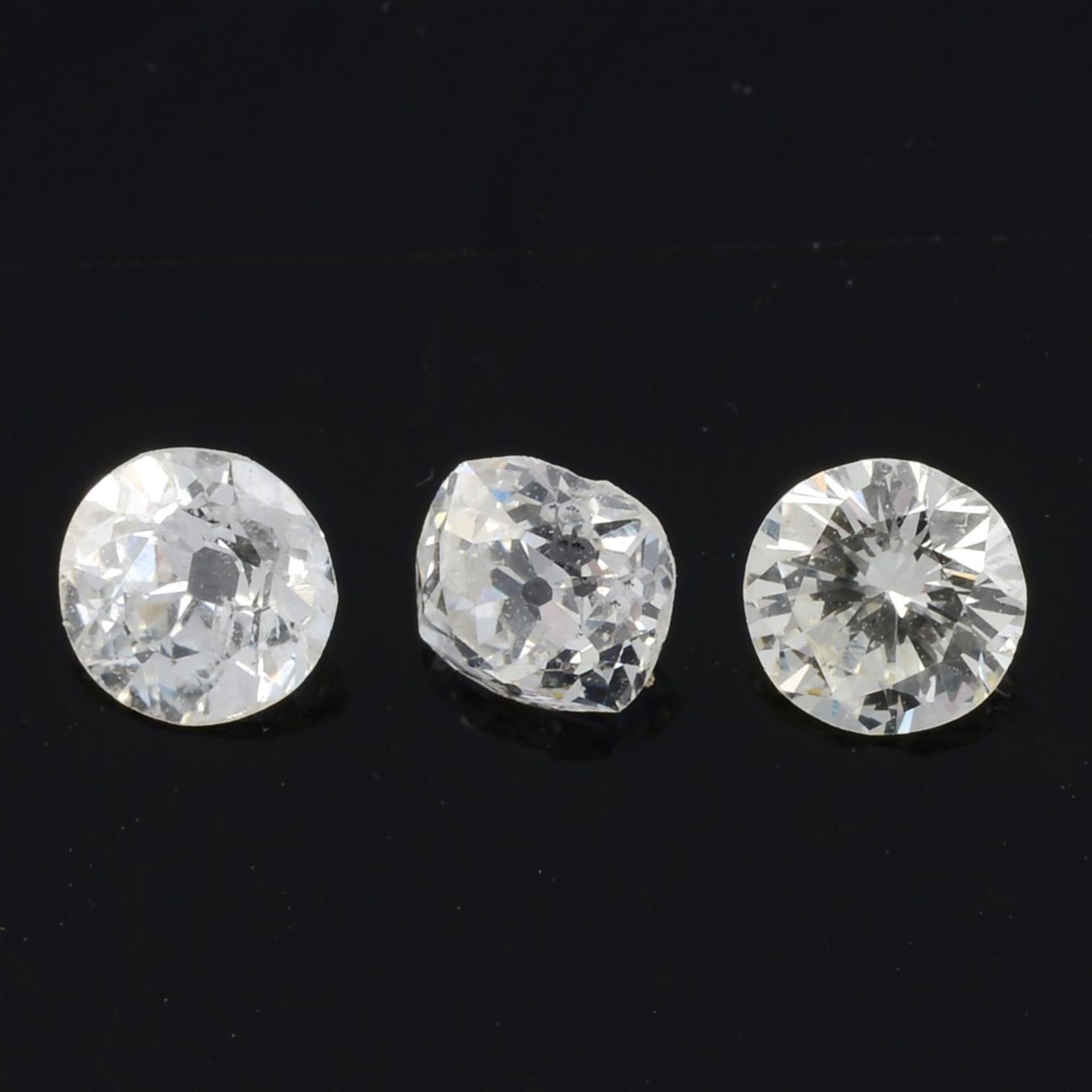 Three vari-cut diamonds, 0.67ct