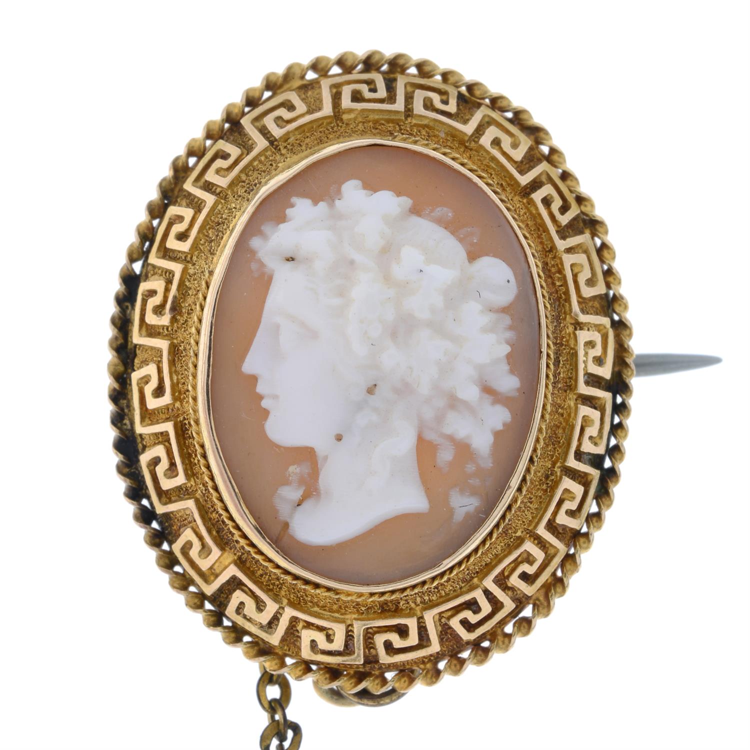 Shell cameo brooch, with Greek key motif surround