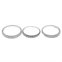 Two platinum & a gold diamond half eternity rings