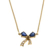 Sapphire & diamond bow pendant on a chain