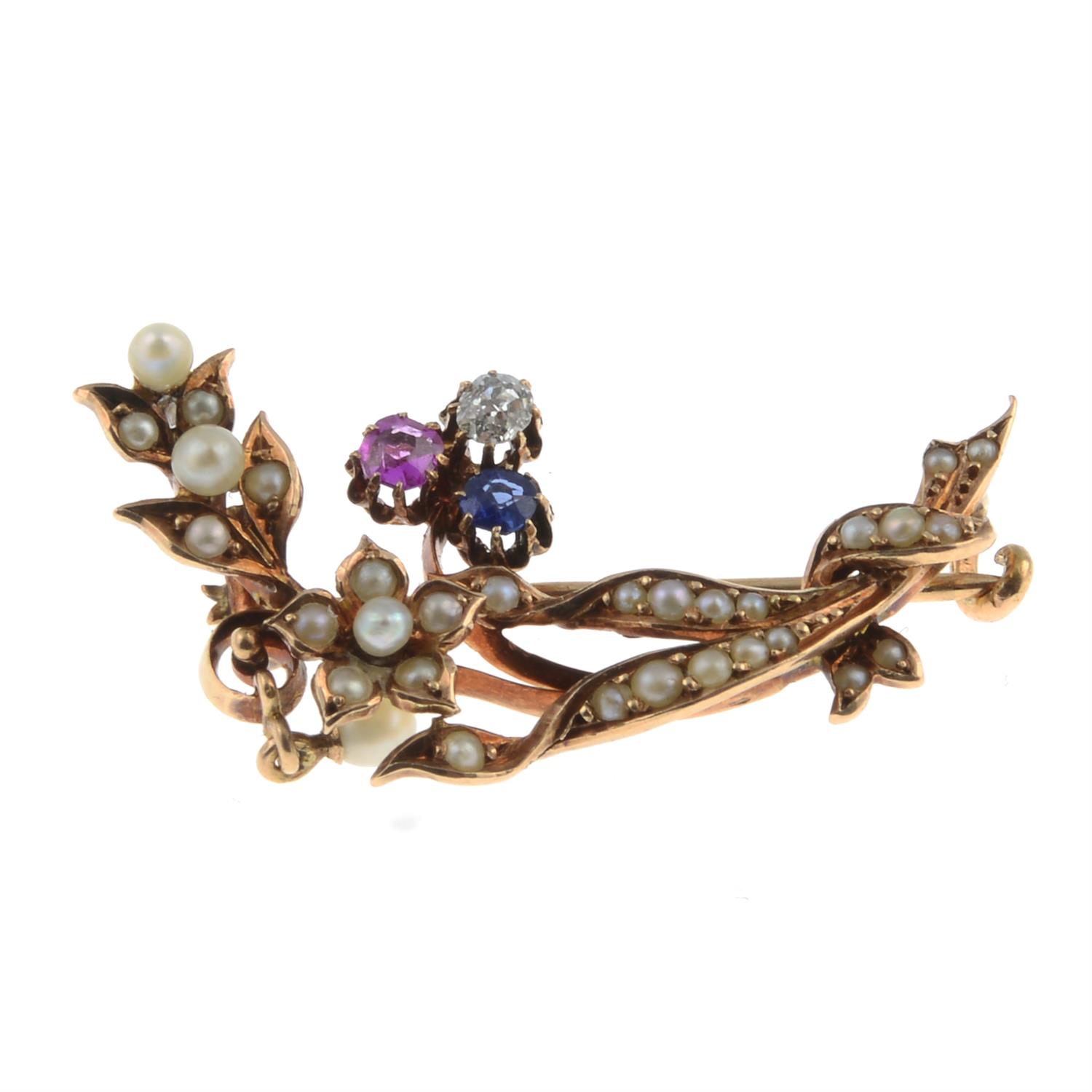 Early 20th gold diamond & gem floral brooch