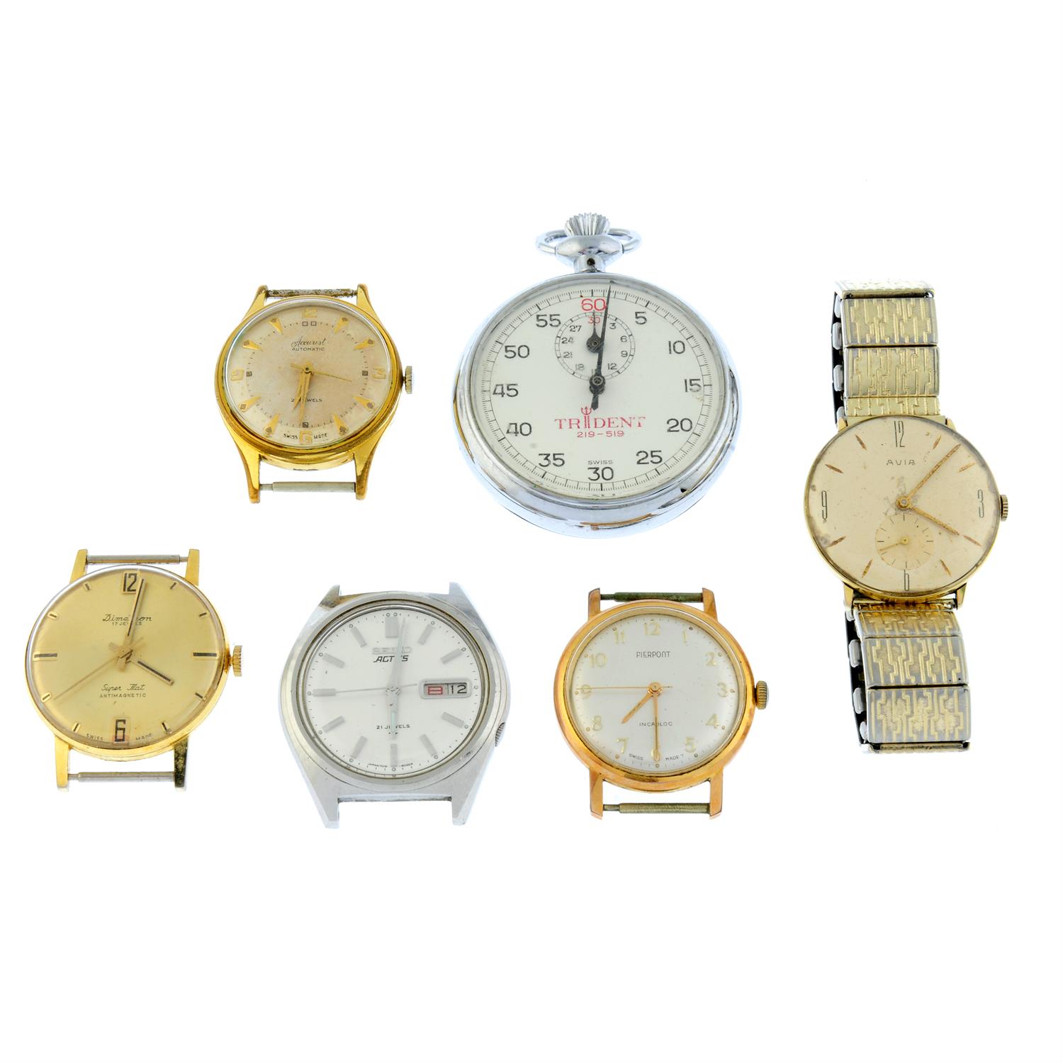 A group of four watch heads, a watch and a stopwatch.