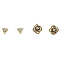 Two 9ct gold diamond stud earrings