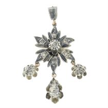 An early 19th century rose-cut diamond floral pendant.