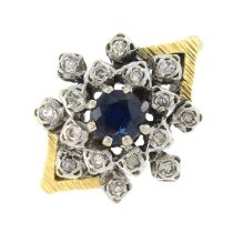 An 18ct gold sapphire and diamond cluster ring.