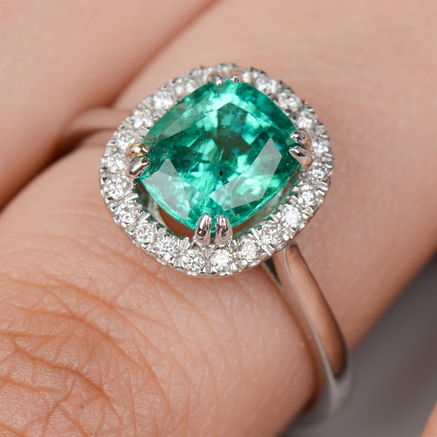 Emerald and diamond cluster ring