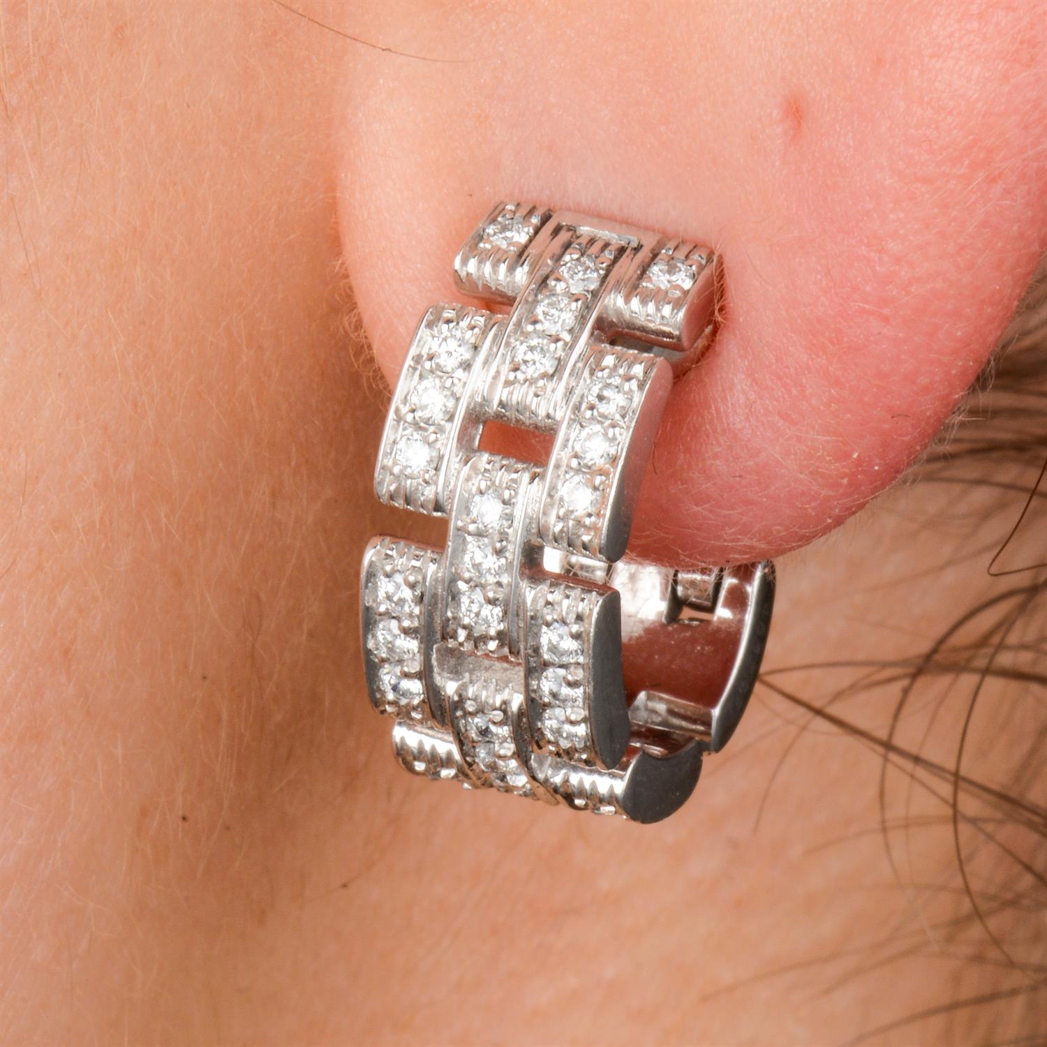 Diamond 'Maillon Panthère' earrings, by Cartier