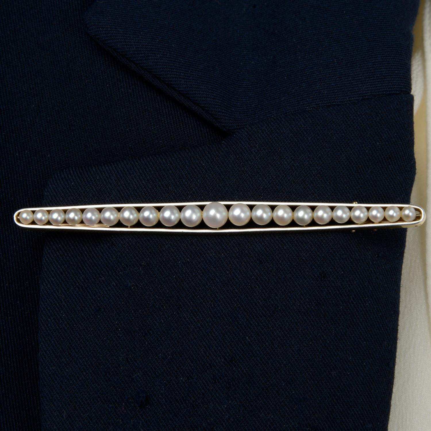 Early 20th century platinum and 15ct gold pearl brooch