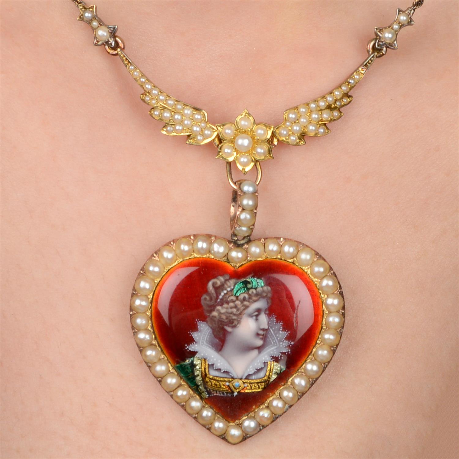 Late 19th century gold enamel heart and wings necklace