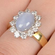 Star sapphire and diamond cluster ring