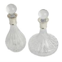 Two contemporary Carrs decanters with silver collars.