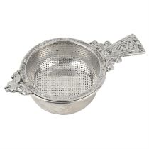 Mid-20th century silver tea strainer.