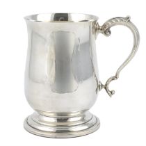 Modern silver balsuter mug.