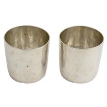 Pair of modern Britannia silver tumbler cups.