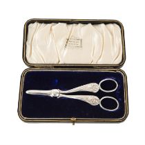 Cased pair of George V silver grape scissors.
