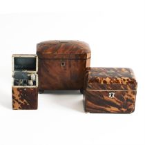 Two 19th century tortoiseshell tea caddies and a necessaire