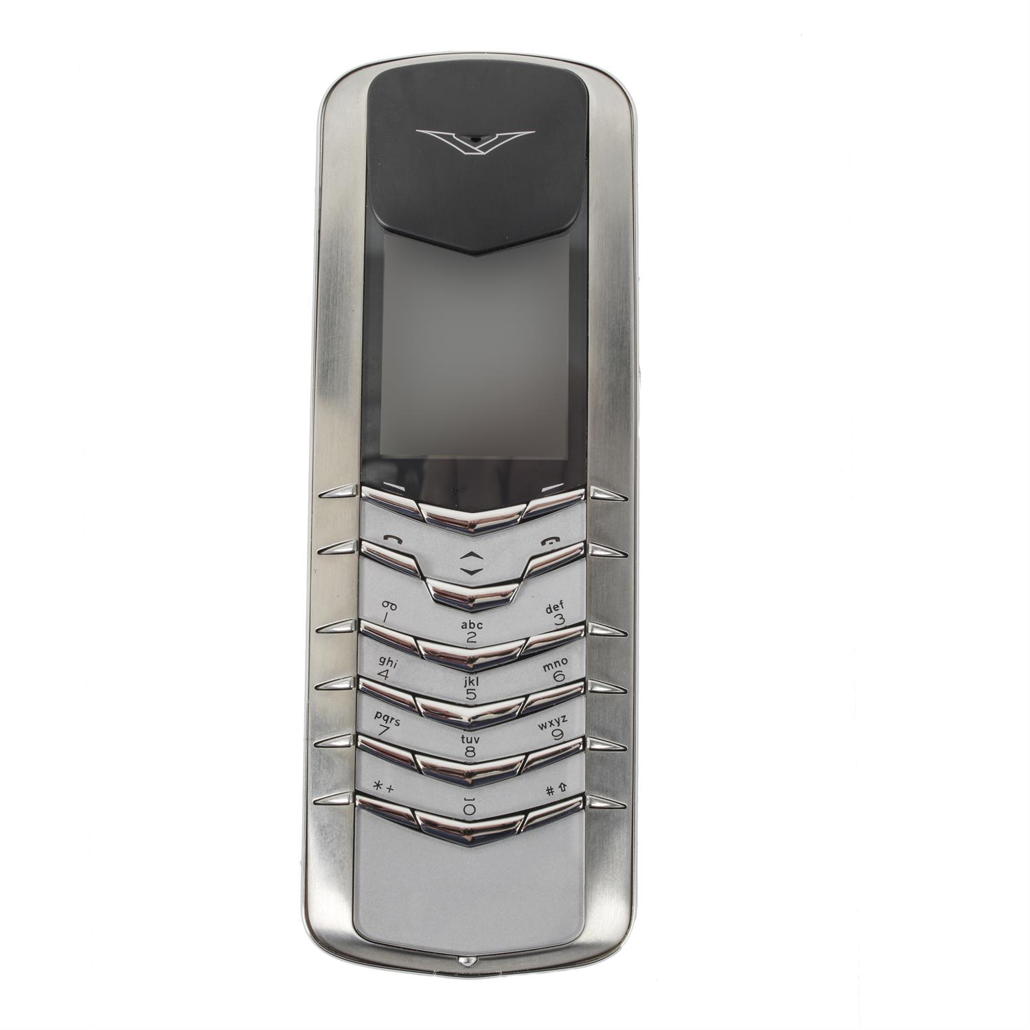 A boxed Vertu mobile phone