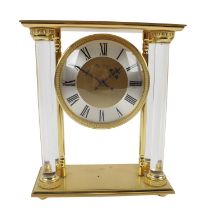 Gilt metal and Perspex clock marked Hour Lavigne