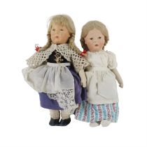 Two linen headed dolls in the manner of Lenci and a collection of vintage games
