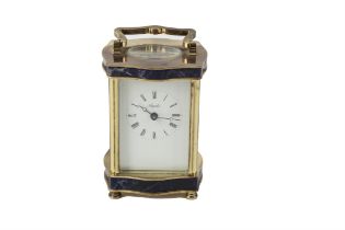 Angelus brass carriage clock set with sodalite