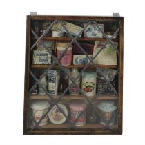 Display cabinet with vintage packaging contents