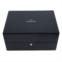 Omega - a group of four watch boxes.