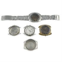 A group of five Seiko Bellmatic cases.