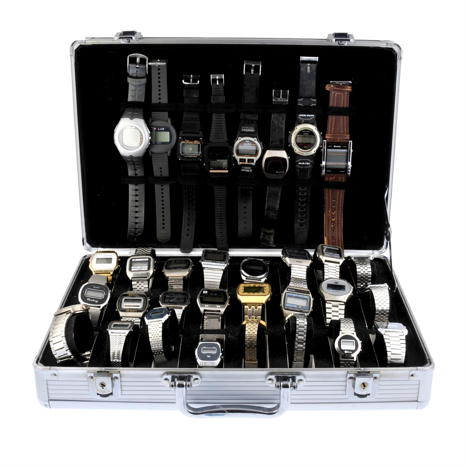 A group of digital watches. Approximately 30.