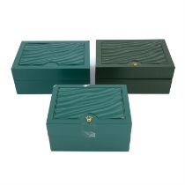 Rolex - a group of three watch boxes.