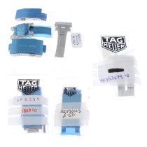TAG Heuer - a group of assorted parts.