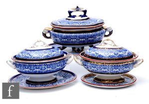A collection of 19th Century Royal Worcester 'Royal Lily' pattern sauce tureens and stands, dated
