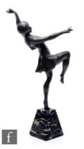 AMENDED DESCRIPTION A large 1920s patinated metal alloy figure of a female dancer standing on