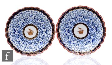 Two Worcester 'Royal Lily' pattern scalloped dishes, circa 1780, with gilt Woryndon family crest