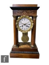 A 19th Century inlaid Portico mantle clock, white enamelled dial within a gilt foliate bezel and
