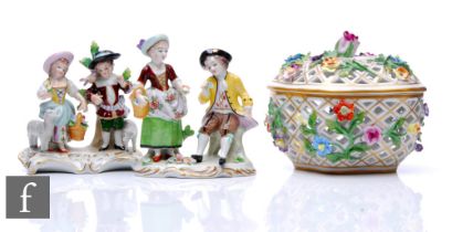 A collection of German porcelain items, to include two Sitzendorf figures, heights 11cm, and a