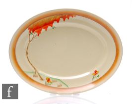 A Clarice Cliff oval meat plate circa 1940, hand painted in a shoulder variant of the Taormina