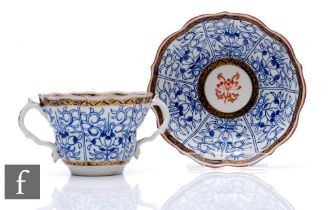 A Worcester 'Royal Lily' pattern chocolate cup and saucer, circa 1770, both with crescent mark,