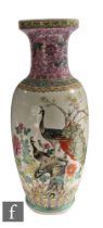 A Chinese late Qing Dynasty (1644-1911) vase, of ovoid form rising to a flared neck and dish mouth