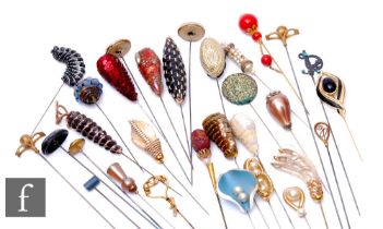 A collection of various hat pins to include faux pearl, beadwork and sequin examples. (40)